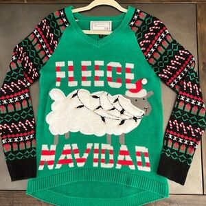 Ugly Christmas sweater, with a play on words. 100% acrylic.